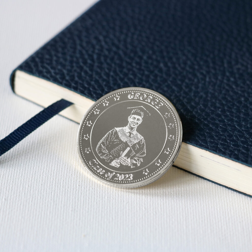 personalized silver coin for a graduation